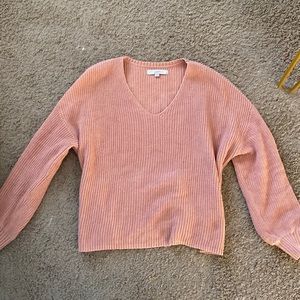Pink V-neck sweater